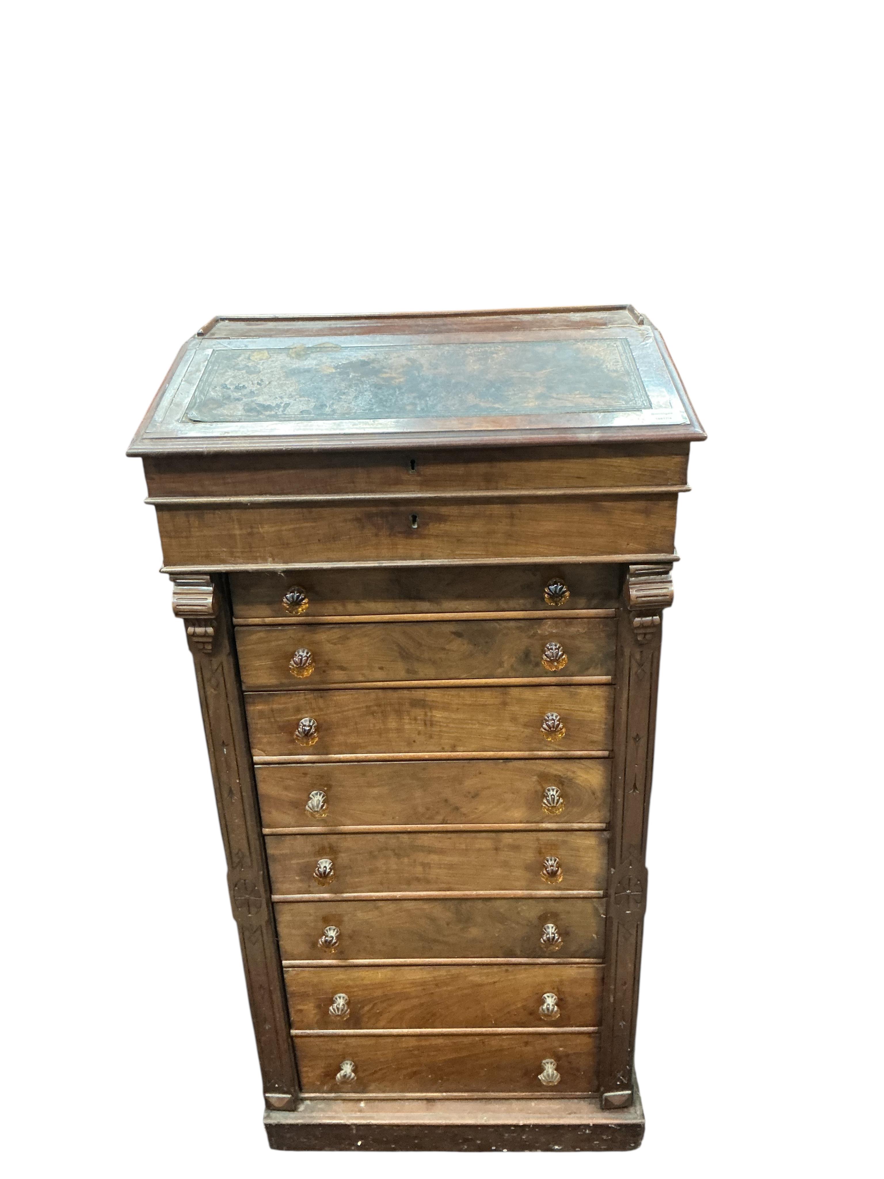 A Victorian mahogany Wellington chest, with writing slope superstructure, width 63cm, depth 40cm, height 130cm